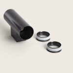 Applique extérieure murale double face anthracite, corps cylindrique métal, éclairage haut et bas.