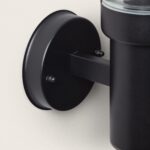 Applique murale extérieure noire en métal, corps cylindrique et platine murale ronde