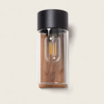 Applique murale extérieure noire avec verre cylindrique transparent et plaque arrière bois