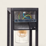 Applique murale noire en aluminium avec verre cylindrique, ampoule visible et câblage apparent