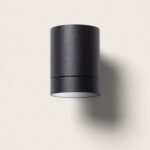 Applique murale extérieure cylindrique noire en aluminium avec diffusion lumineuse dirigée vers le bas