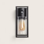 Applique murale extérieure métal noir avec détecteur de mouvement et cylindre en verre abritant ampoule vintage