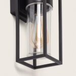 Applique murale extérieure noire en métal avec verre cylindrique et ampoule visible