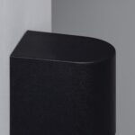 Applique murale extérieure noire, corps rectangulaire avec dessus arrondi, finition texturée pour fixation murale