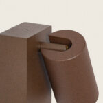 Applique murale extérieure aluminium rouille, tête cylindrique orientable sur socle carré