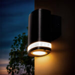 Applique murale extérieure cylindrique noire en métal avec anneau lumineux LED, fixation murale