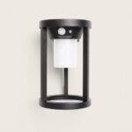 Applique murale extérieure noire en métal avec détecteur et diffuseur blanc cylindrique, design ouvert