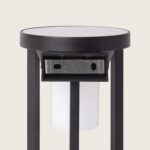 Applique murale solaire noire en aluminium mat, diffuseur cylindrique blanc, détecteur de mouvement visible