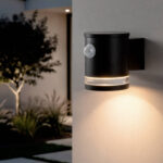 Applique murale noire cylindrique en aluminium avec détecteur de mouvement et bande LED éclairage vers le bas