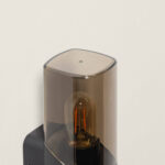 Applique murale noire à verre fumé cylindrique avec ampoule filament visible