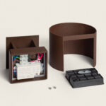 Applique murale extérieure rouille en aluminium ronde démontée montrant boîtier, câblage et cache cylindrique