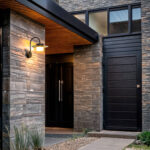 Applique murale extérieure noire en aluminium, bras courbé, lumière dirigée vers le bas