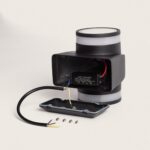 Applique murale noire à diffuseurs blancs, boîtier ouvert montrant driver et câbles pour montage en saillie