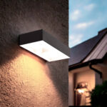 Applique murale extérieure rectangulaire noire avec diffuseur blanc, éclairage chaud dirigé vers le bas