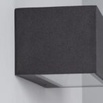 Applique murale noire texturée forme cubique éclairage vers le bas