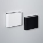 Applique murale rectangulaire blanche et noire, bords arrondis, finition mate, éclairage double face, fixation murale