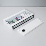 Applique murale blanche rectangulaire démontée, boîtier LED double-face avec connectique et driver visibles