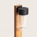 Balise sur pied métal noir et cylindre en verre transparent fixé sur fût bois