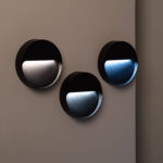 Balise murale ronde noire en applique, ouverture lumineuse demi-circulaire