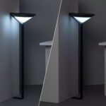 Balise sur pied LED noire à tête triangulaire avec diffuseur blanc et finition métal