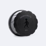 Détecteur de mouvement radar noir circulaire avec pictogramme personne, boîtier compact