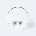 Détecteur de mouvement blanc rond en saillie avec deux contacts électriques visibles