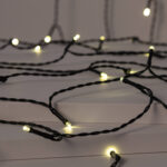 Guirlande LED câble noir avec petites LED blanc chaud