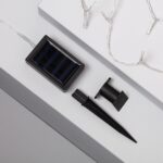 Guirlande LED solaire avec panneau solaire noir, piquet et support de fixation, câble lumineux blanc