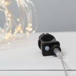 Guirlande LED fil de fer, lumières blanc chaud, câble transparent et boîtier noir avec petit élément circulaire
