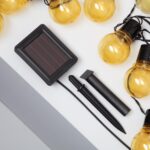 Guirlande LED solaire ampoules globe jaunes, panneau solaire et piquets de fixation