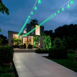 Guirlande LED extérieure suspendue, ampoules globes vertes G45 sur câble blanc, éclairage terrasse
