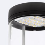 Lampadaire LED tête cylindrique noire, module LED visible, diffuseur en verre transparent et montants métalliques