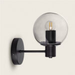 Applique murale en métal noir avec globe en verre transparent et douille visible
