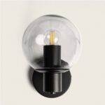 Applique murale noire en métal avec globe en verre transparent et ampoule filament visible