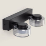 Applique murale double noire en métal avec deux abat-jours transparents en verre, fixation rectangulaire