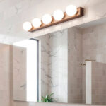 Applique murale 5 globes opalins, support métal finition bois, fixation au‑dessus du miroir