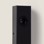 Applique murale noire en métal, corps rectangulaire et support circulaire pour ampoule