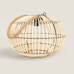 Lampe à poser ronde en rotin naturel avec anse en corde, structure ajourée