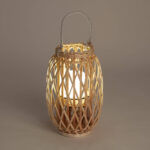 Lampe à poser LED rotin naturel en forme de lanterne ovale avec anse métallique