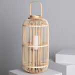 Lampe à poser rotin naturel cylindrique avec poignée et abat-jour ajouré