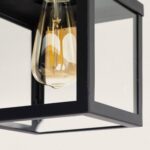 Plafonnier extérieur noir à cadre cubique métallique et ampoule à filament visible