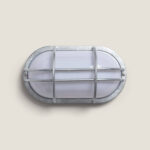 Plafonnier extérieur ovale en acier galvanisé avec diffuseur opalin et grille de protection