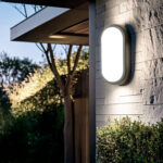 Hublot extérieur ovale LED monté en applique cadre noir et diffuseur blanc