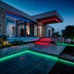 Ruban LED extérieur multicolore (vert, bleu, rouge) installé sur bordures de terrasse, marches et sous avancée, éclairage linéaire