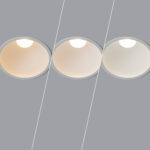 Downlight encastré blanc rond montrant trois températures de couleur du blanc chaud au blanc froid