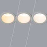 Spot encastrable LED blanc circulaire montrant trois températures de couleur chaud à neutre à froid