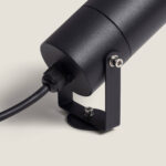 Spot extérieur cylindrique noir mat en aluminium sur support, câble et fixation réglable visibles