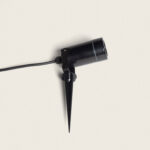 Spot extérieur sur piquet noir, boîtier cylindrique, tige pointue et câble