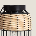 Suspension extérieure en rotin tressé beige avec cage métallique noire, forme cylindrique pour installation suspendue