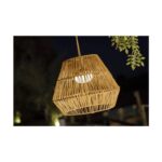 Suspension extérieure en rotin tressé naturel, forme géométrique facettée, ampoule visible, suspendue